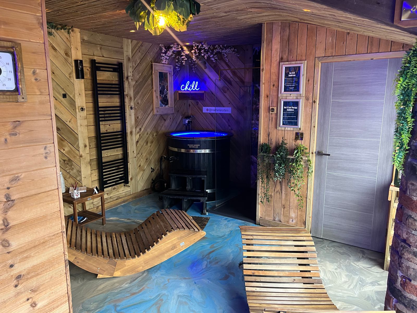 The private Serenity Room, with an indoor ice bath and sauna entrance.
